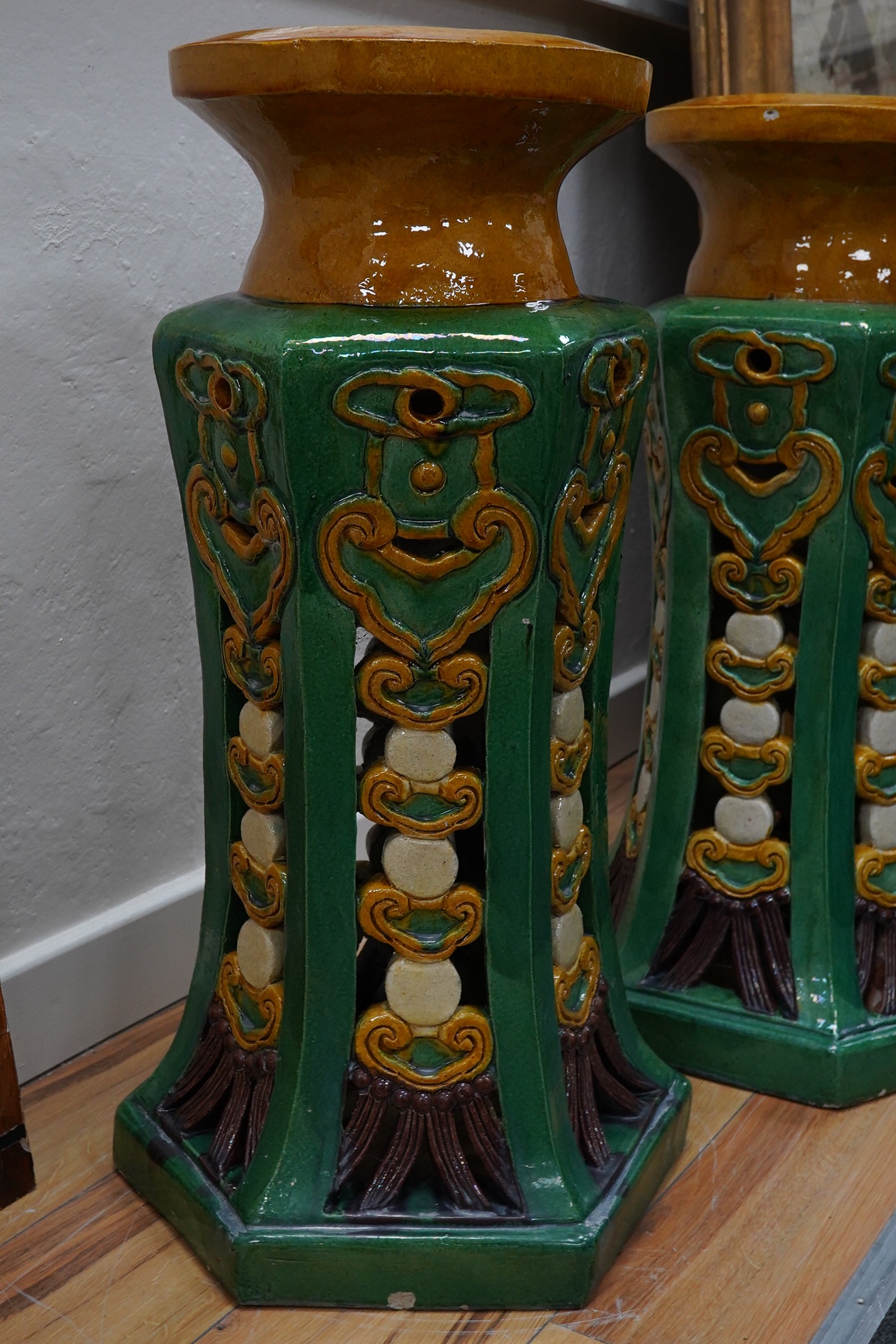 A large pair of Chinese pottery jardiniere stands, sancai, 71cm high. Condition - fair, some chipping